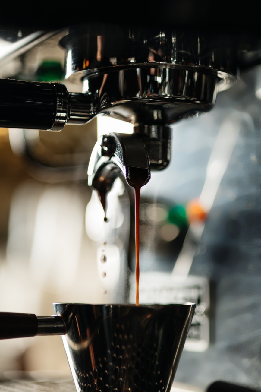 An espresso pulled fresh at the machine