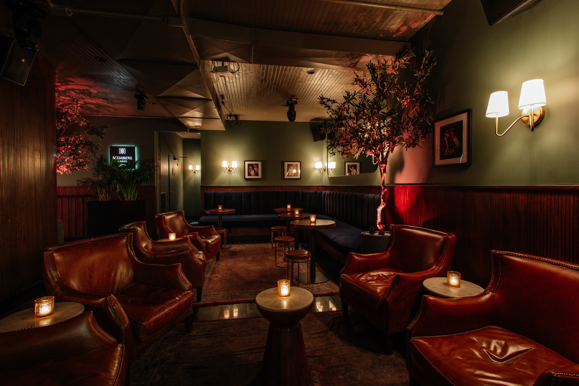 The green room — banquette seating and framed pictures in the lounge